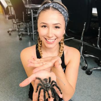 Becca Robertson holding tarantula