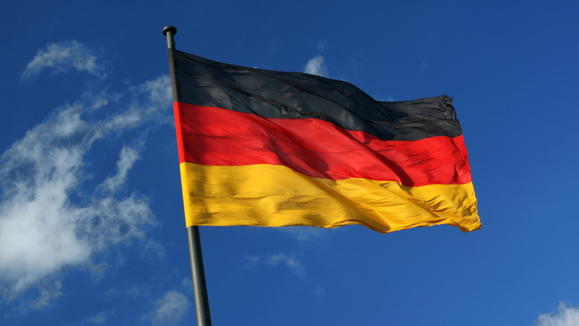 German flag flying on flag pole
