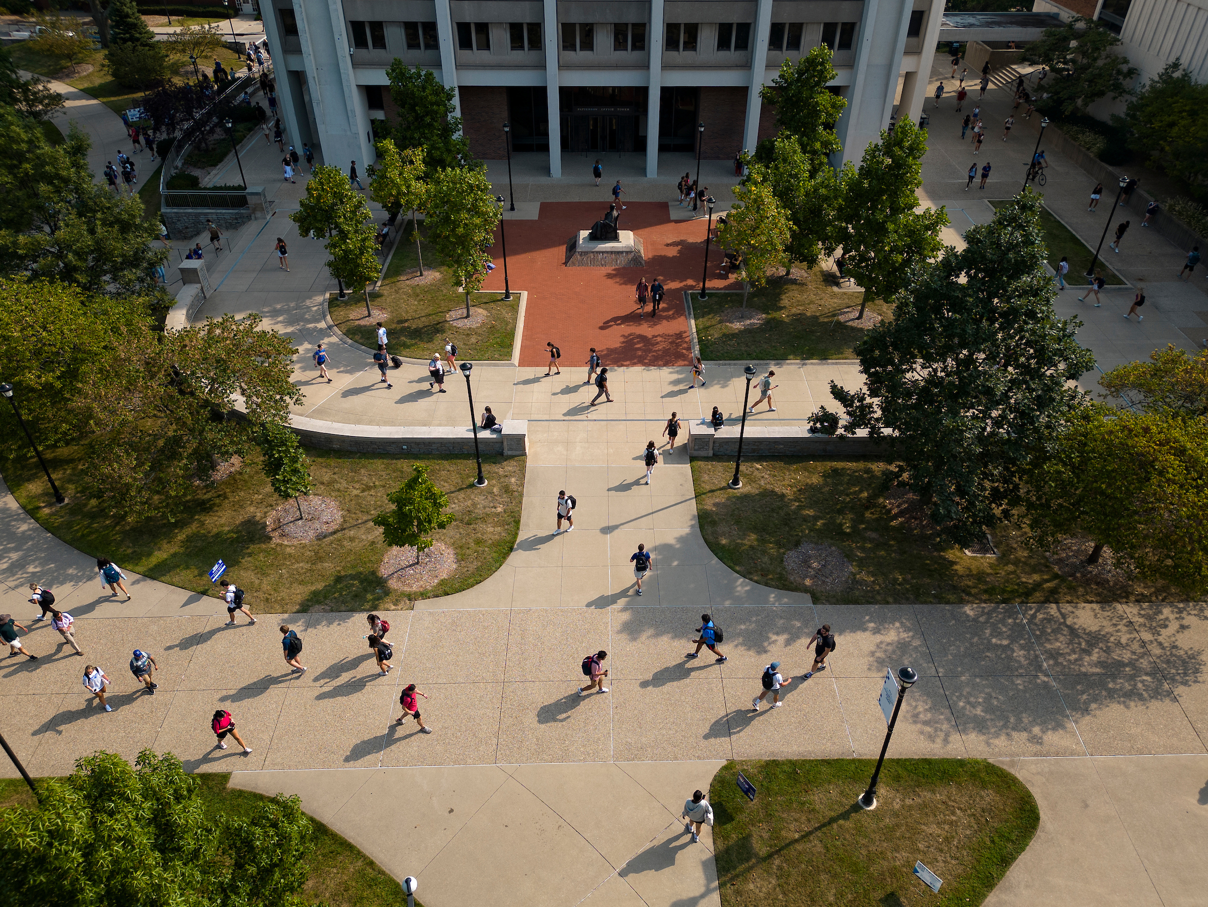 aerial photo of students walking across campus