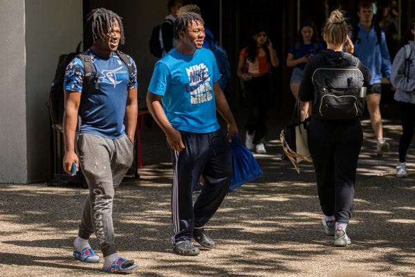 students walking on campus