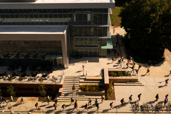 overhead photo of students walking beside the Chemistry-Physics building on campus