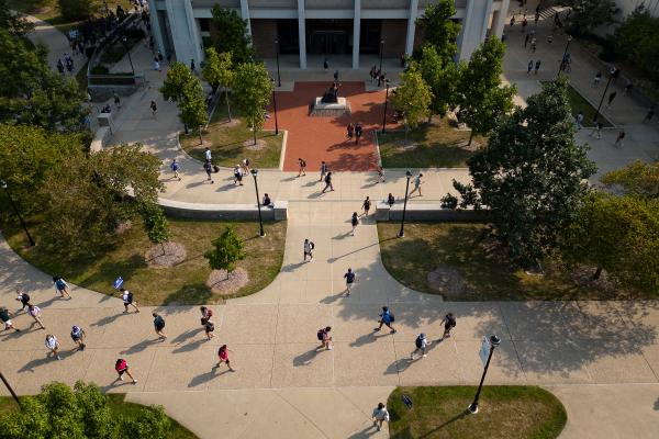 aerial photo of students walking across campus