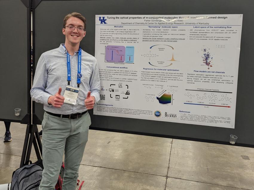Parker Sornberger in front of research poster