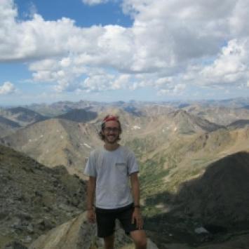 Sean Ehlman in front of mountains