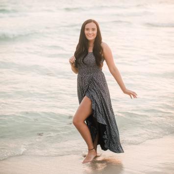 Sarah Bolton standing in front of ocean