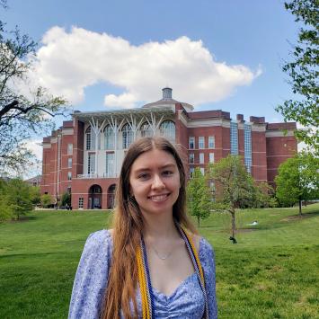 photo of Meg Connor in front of WT Young Library